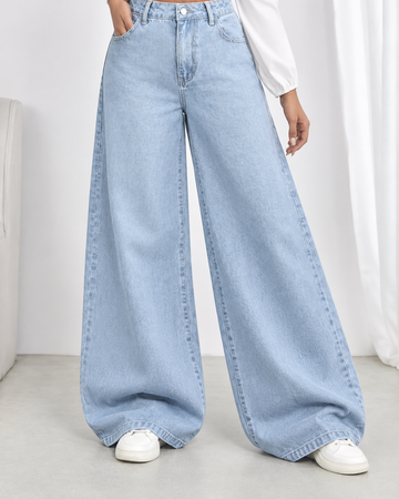 The Drip - Mid Wash Wide-Leg Jeans; front detail showing wide-leg fit