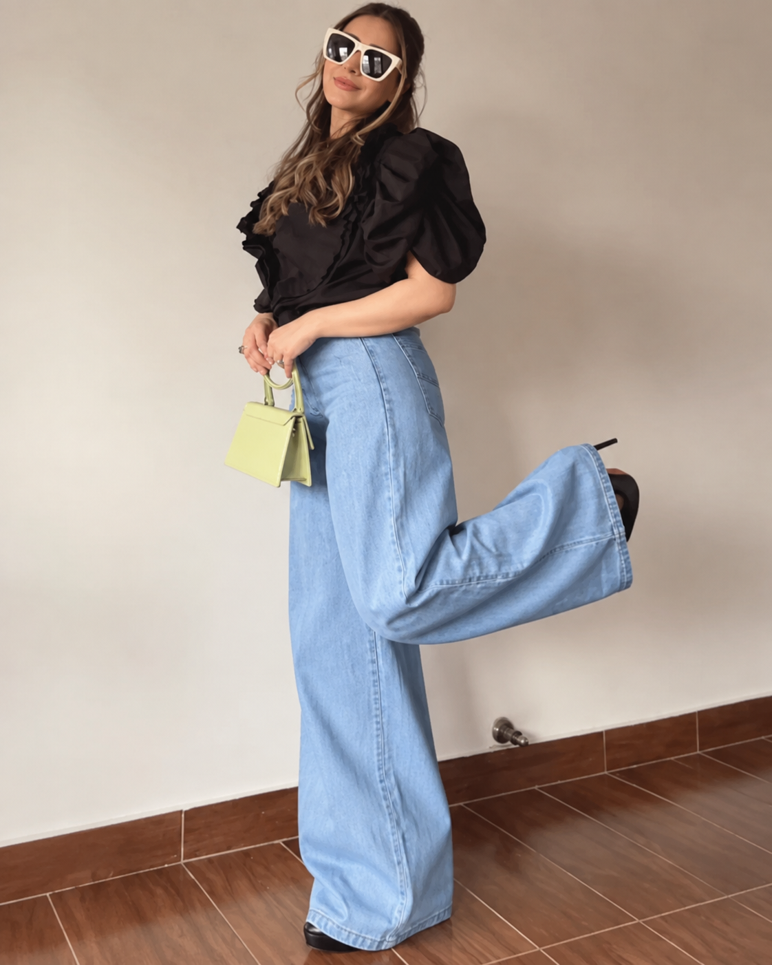 The Drip - Mid Wash Wide-Leg Jeans; outdoor styling on model