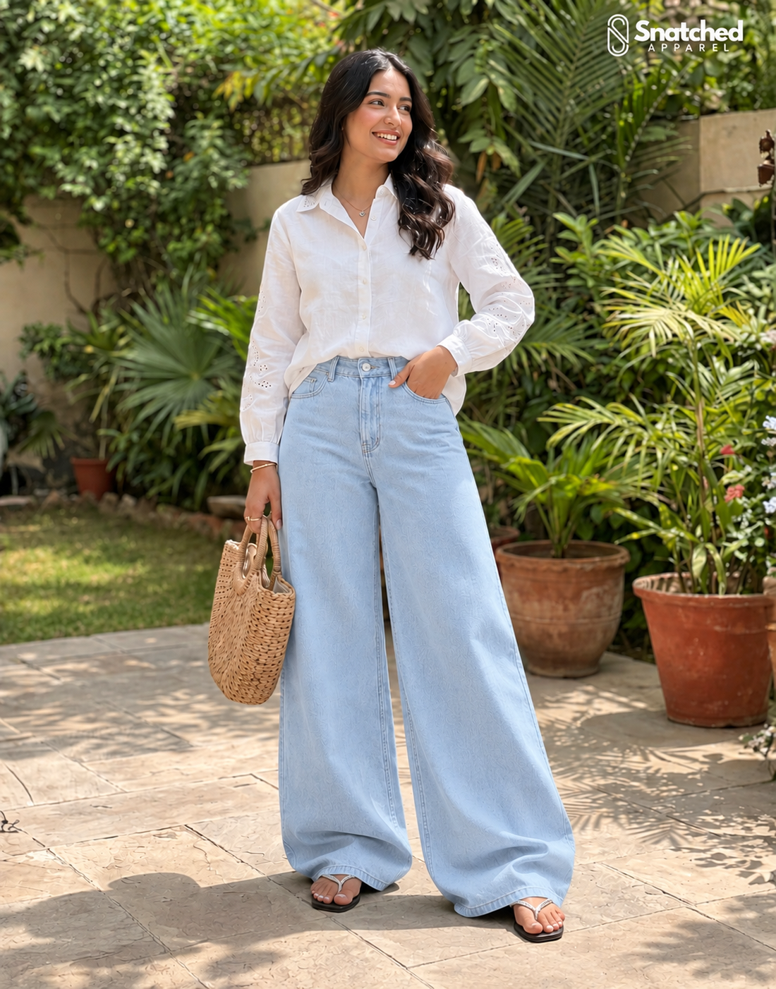 The Vibe - Light Wash Wide-Leg Jeans; outdoor styling on model