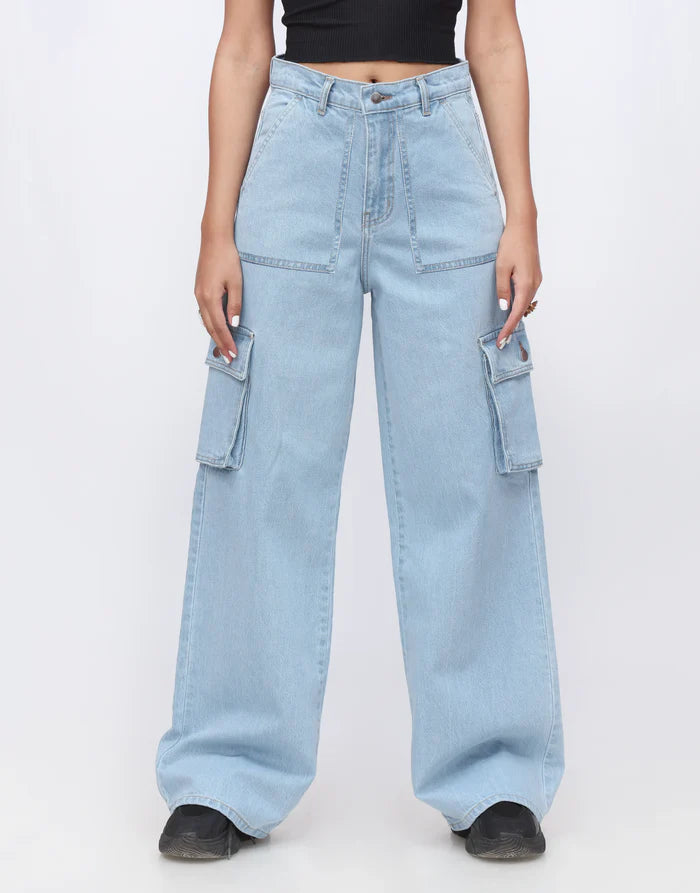 Light blue cargo pants worn by a person on a white background