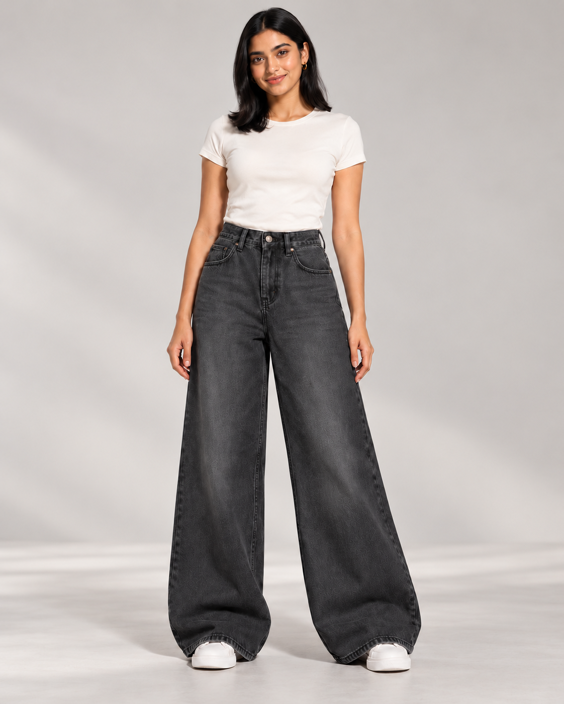 The Eclipse faded-black super wide-leg jeans, studio model view