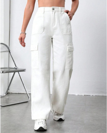 Person wearing white cargo pants with a minimal background